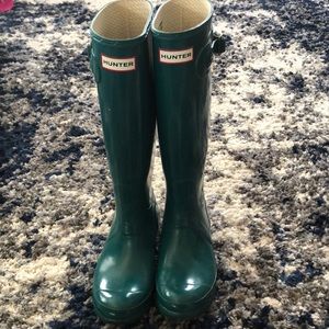 Tall glossy Hunter rain boots